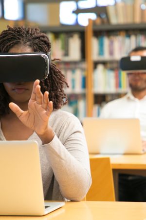 mix raced group of students using vr experience for studying